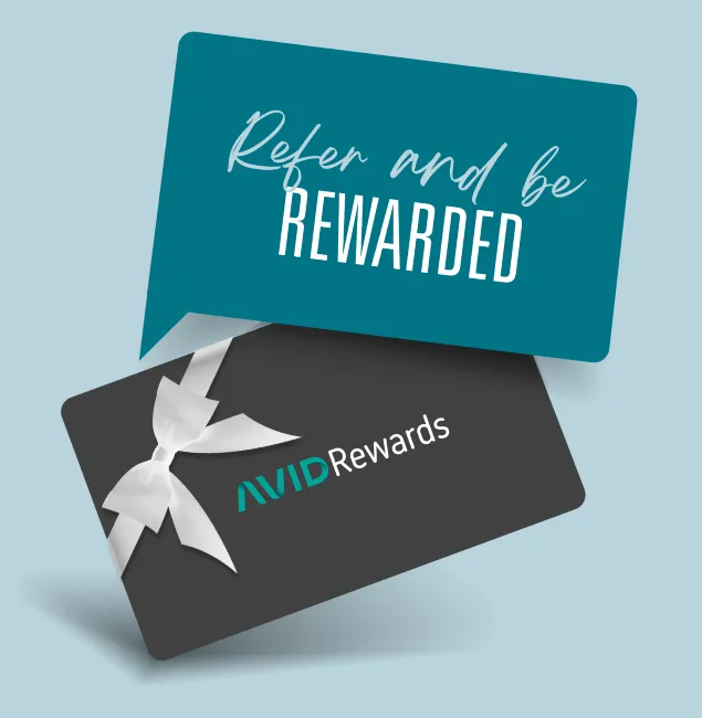 A teal speech bubble with the text "Refer and be REWARDED" above a black gift card labeled "AVID Rewards" with a white ribbon on a light blue background.